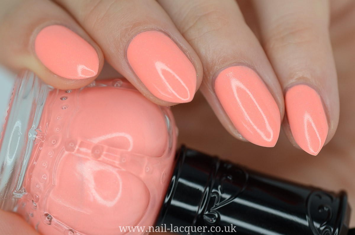 1. OPI Nail Lacquer in "Peaches & Cream" - wide 2